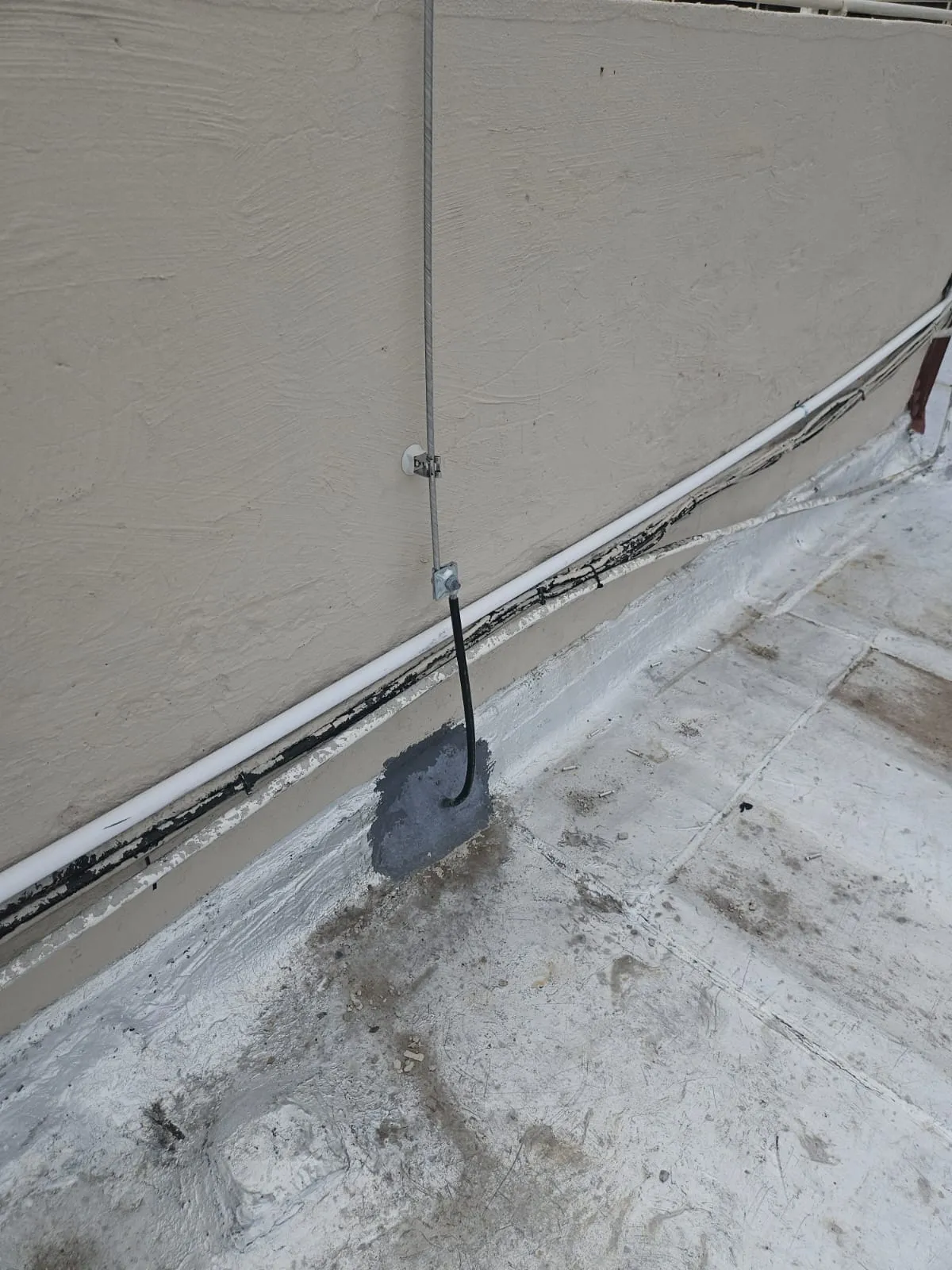 Lightning protection bonded to a building steel frame.
